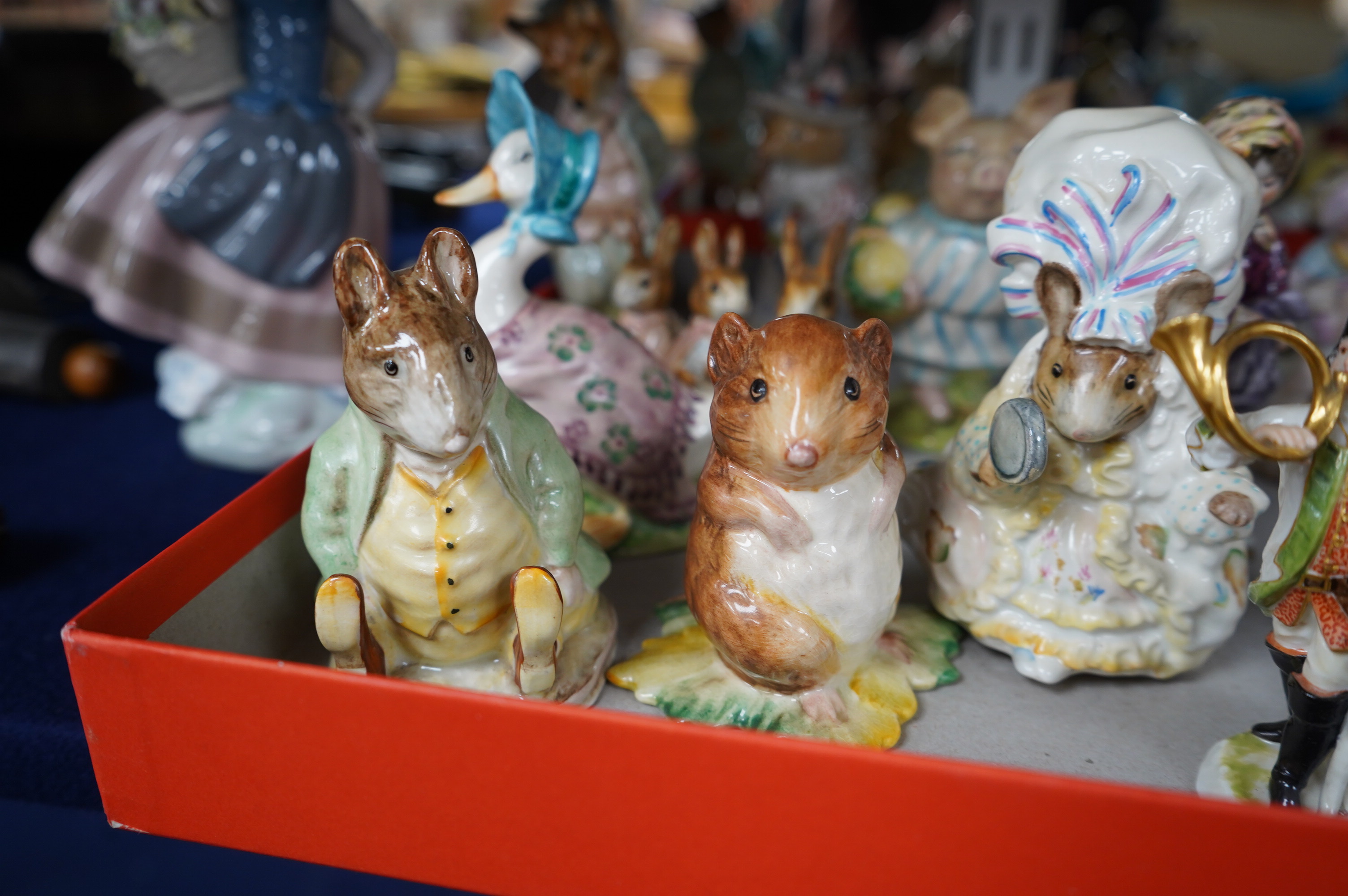 A collection of Beswick Beatrix Potter figures and other porcelain figures, including Meissen, Doulton and Lladro. Condition - mostly good